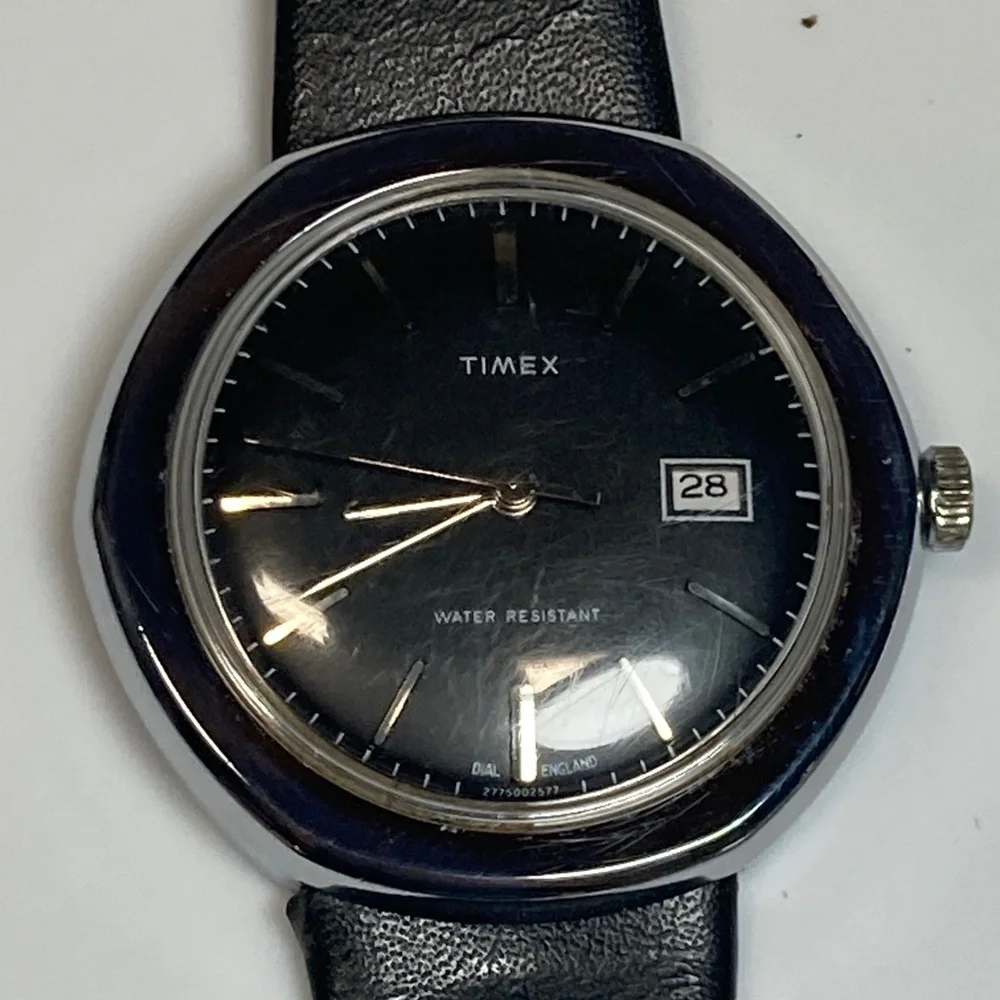 Vintage Timex watch, black dial, domed crystal, 2 straps, 1 leather, 1 stainless